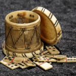 FRENCH MINIATURE CARVED BONE DRUM CONTAINING DOMINO SET