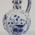 Puzzle jug dated 1689